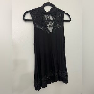 S Charming Charlie’s black flowy tank with mesh lace details